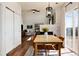 Dining Room with an adjacent living space with fireplace and outdoor access at 4963 Collingswood Dr, Highlands Ranch, CO 80130