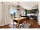 Bright dining space with sliding glass doors leading to the outdoor patio at 4963 Collingswood Dr, Highlands Ranch, CO 80130
