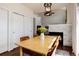 Open floorplan from the dining area with views of living room and fireplace at 4963 Collingswood Dr, Highlands Ranch, CO 80130