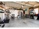Spacious two car garage with ample storage, refrigerator, and bike rack at 4963 Collingswood Dr, Highlands Ranch, CO 80130