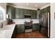 Functional kitchen with stainless steel appliances and modern fixtures at 4963 Collingswood Dr, Highlands Ranch, CO 80130