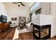 Inviting living room featuring a fireplace, high ceilings, and ample natural light at 4963 Collingswood Dr, Highlands Ranch, CO 80130