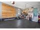 Spacious garage featuring storage, room for multiple bikes, and a basketball hoop for added recreation at 18926 W 93Rd Ave, Arvada, CO 80007