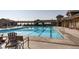 Enjoy the community pool for exercise and relaxation on a sunny day at 18926 W 93Rd Ave, Arvada, CO 80007