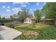 Spacious backyard with a storage shed and ample room for outdoor activities and gardening at 4591 S Pennsylvania St, Englewood, CO 80113