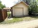 Garage with a single door and house number 4591 in front of the yard at 4591 S Pennsylvania St, Englewood, CO 80113