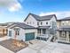 Beautiful two-story home featuring a well-manicured lawn, and a two car garage, perfect for Gathering living at 631 Felicity Loop, Castle Rock, CO 80109