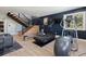 Home gym with modern exercise machines and a view, located near the staircase at 2536 N State Highway 67, Sedalia, CO 80135