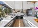 Beautiful kitchen with stainless steel appliances, granite countertops, and a picturesque nature view at 2536 N State Highway 67, Sedalia, CO 80135