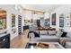 Bright and airy living room featuring modern furnishings and an open floor plan with vaulted ceilings at 2536 N State Highway 67, Sedalia, CO 80135