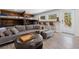 Comfortable living room with a bunk bed, a large sectional sofa, and a small bar area at 2536 N State Highway 67, Sedalia, CO 80135