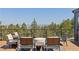 Outdoor patio featuring a seating area with views of the forest and mountains at 2536 N State Highway 67, Sedalia, CO 80135