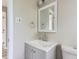Bathroom featuring new vanity with chrome faucet at 4624 W Virginia Ave, Denver, CO 80219
