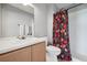 Well-maintained bathroom with shower and tub combo and stylish decor at 7977 Emerson Ave, Frederick, CO 80530
