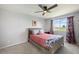 Bedroom with modern decor and window with scenic view at 7977 Emerson Ave, Frederick, CO 80530