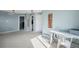 This spacious loft includes neutral paint and carpet at 7977 Emerson Ave, Frederick, CO 80530