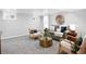 Basement living room featuring a comfortable seating area, decor and natural light at 3321 Stuart St, Denver, CO 80212