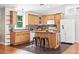 Bright kitchen with bar seating and tile backsplash at 3321 Stuart St, Denver, CO 80212