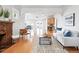 Spacious living room featuring hardwood floors, open layout, and abundant natural light at 3321 Stuart St, Denver, CO 80212