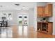 Bright open floorplan with french doors to outdoor patio and built in corner cabinet at 3321 Stuart St, Denver, CO 80212