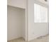 Spacious walk-in closet, featuring a window, providing ample storage space at 9852 E Idaho St, Aurora, CO 80247
