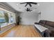 Bright living room featuring gleaming hardwood floors and a comfortable layout at 4102 W Eastman Ave, Denver, CO 80236