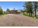Spacious home with a green roof and large green garage door at 16861 Wrangler Trl, Littleton, CO 80127