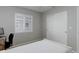 Bedroom with window shutters and sliding closet doors at 15372 E 117Th Ave, Commerce City, CO 80022