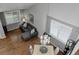 Bright living room with hardwood floors, gray sofa, and high ceilings at 15372 E 117Th Ave, Commerce City, CO 80022