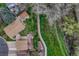 Panoramic aerial view of the property, showcasing the expansive backyard, mature trees, and proximity to a green space at 9401 Otis St, Broomfield, CO 80021