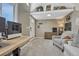 Inviting office space featuring a modern desk, comfortable armchair, and ample storage at 9401 Otis St, Broomfield, CO 80021