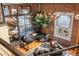 Office space with industrial-style lighting, brick walls, and large windows at 1792 Wynkoop St # 505, Denver, CO 80202