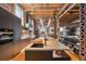Well-equipped kitchen with stainless steel appliances, large island, modern lighting, and exposed brick at 1792 Wynkoop St # 505, Denver, CO 80202