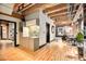 Modern kitchenette that opens to the living room, featuring light wood cabinetry and stainless steel appliances at 1792 Wynkoop St # 505, Denver, CO 80202