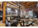 Open-concept living space with hardwood floors, exposed brick, and stylish furnishings at 1792 Wynkoop St # 505, Denver, CO 80202
