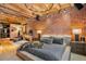 Stylish main bedroom features exposed brick, wood beams, and modern decor at 1792 Wynkoop St # 505, Denver, CO 80202