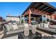 Outdoor patio with comfortable seating, dining area, grill, and blue sky view at 1792 Wynkoop St # 505, Denver, CO 80202