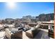 Rooftop deck with comfortable seating and panoramic city views at 1792 Wynkoop St # 505, Denver, CO 80202