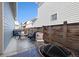 Cozy back patio featuring comfortable outdoor seating, firepit, and privacy fence at 6334 N Dayton Way, Denver, CO 80238