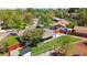View of the home features a large yard with a patio and fenced RV parking area at 45 S Reed St, Lakewood, CO 80226