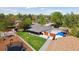 Aerial view showcases the home, large yard, RV parking and patio at 45 S Reed St, Lakewood, CO 80226