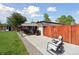 The well kept backyard has a covered patio, outdoor seating area and is fully fenced for privacy at 45 S Reed St, Lakewood, CO 80226