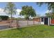 A storage shed, small garden area and chain link fence provide functional spaces in the well maintained backyard at 45 S Reed St, Lakewood, CO 80226