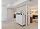 Finished basement area with white dresser and doorways leading to other finished rooms at 45 S Reed St, Lakewood, CO 80226