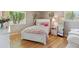 Cozy bedroom with natural light, hardwood floors, and elegant decorations at 45 S Reed St, Lakewood, CO 80226