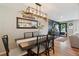 Elegant dining room featuring a stylish table setting and a view of the entryway at 45 S Reed St, Lakewood, CO 80226