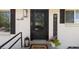 Elegant front door entrance with decorative details and a welcoming ambiance at 45 S Reed St, Lakewood, CO 80226