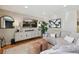 Bright living area featuring modern decor, plush seating, and stylish furnishings at 45 S Reed St, Lakewood, CO 80226