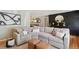 Inviting living room with ample seating, chic decor, and a cohesive design at 45 S Reed St, Lakewood, CO 80226