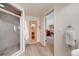 Bathroom with a shower, sauna, and adjacent access to other rooms at 1221 Havenwood Way, Castle Pines, CO 80108